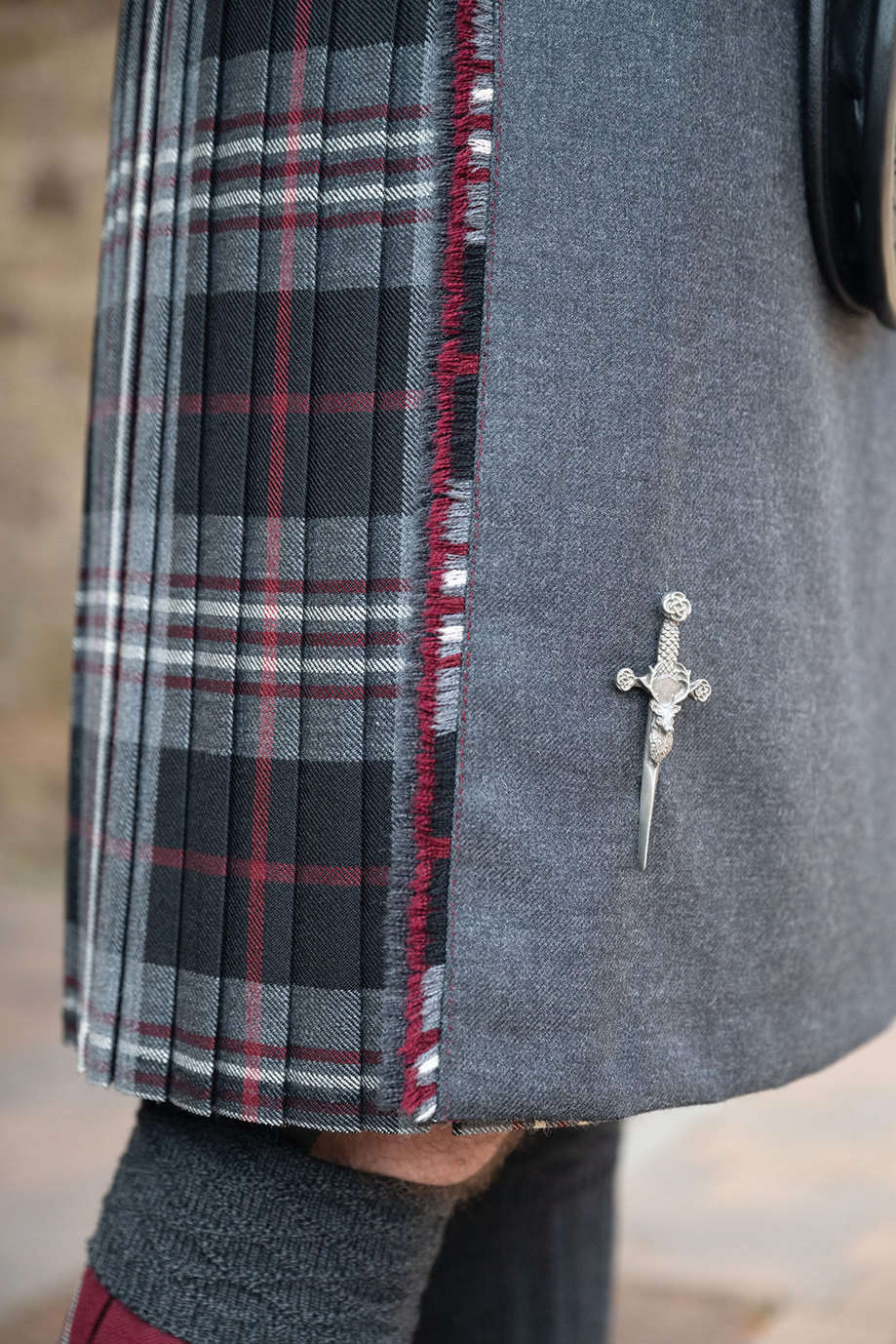 Grey and dark red kilt detail from Eight Yards' kilt outfit
