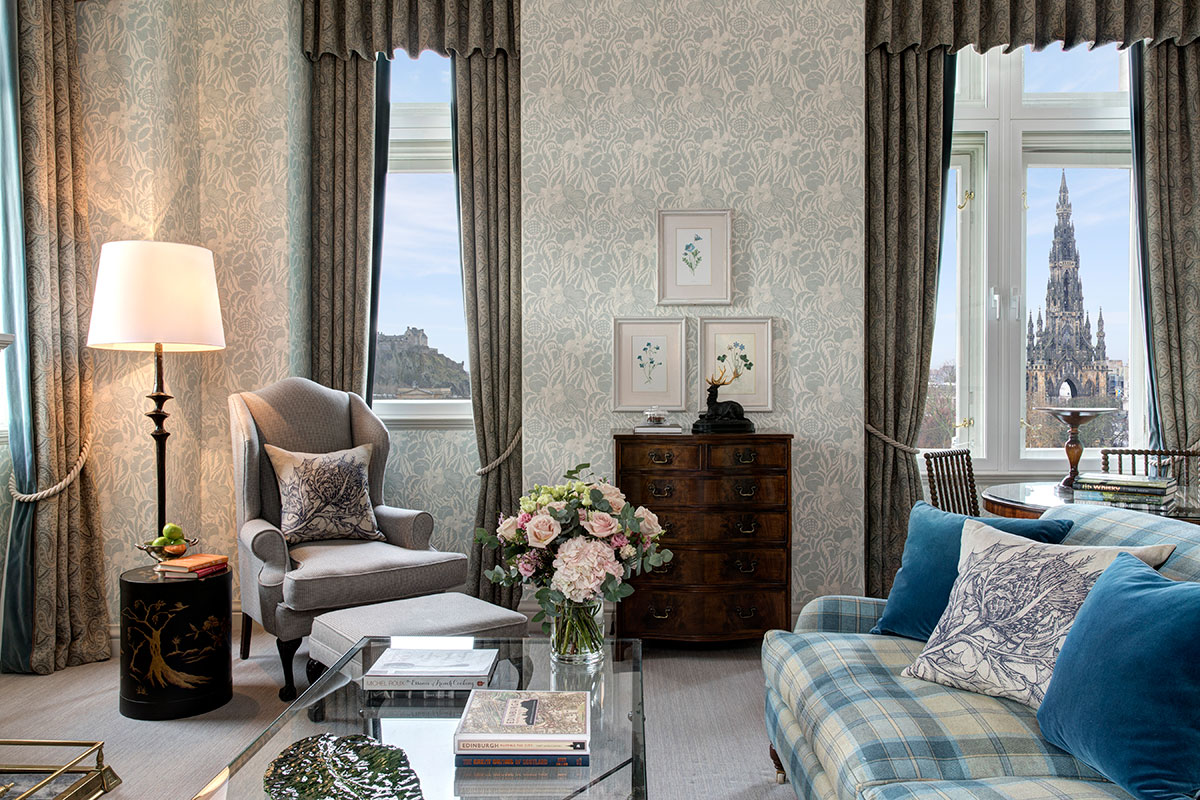 Luxury Castle View Suite at The Balmoral in Edinburgh with elegant lounge area and panoramic views of Edinburgh Castle