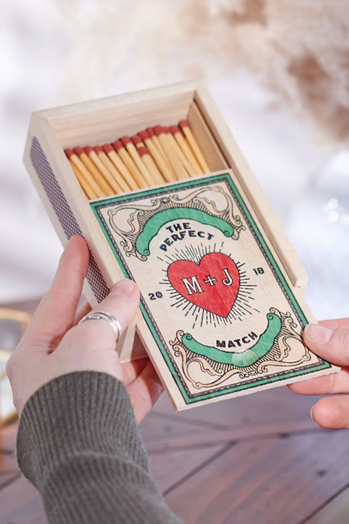 Personalised wooden matchbox with couple initials and wedding date, a small personalised wedding gift idea for newlyweds