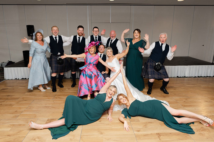 a photo dash with wedding guests at the Old Course Hotel.