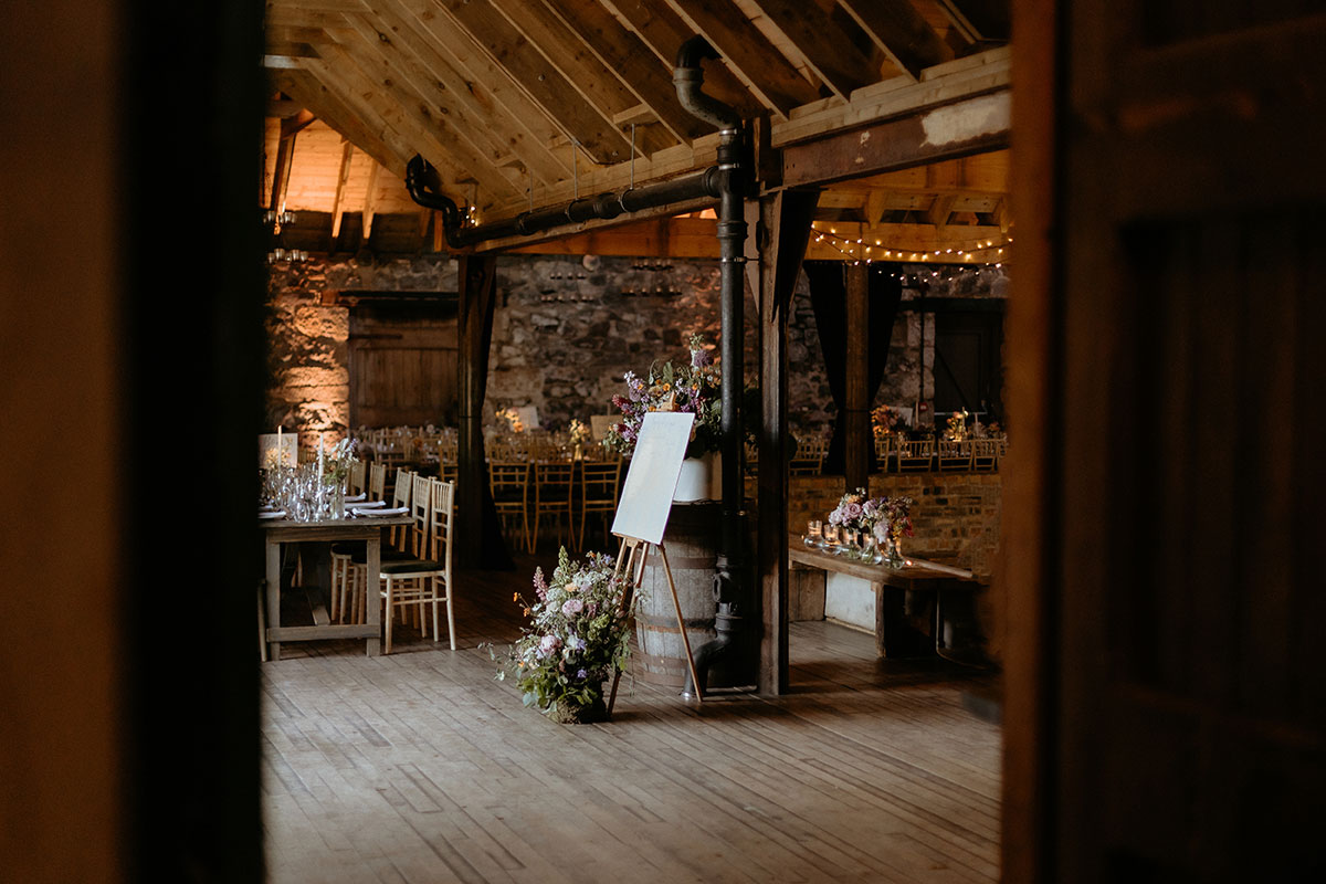 Interior shot of The Byre at Inchyra set up for a wedding