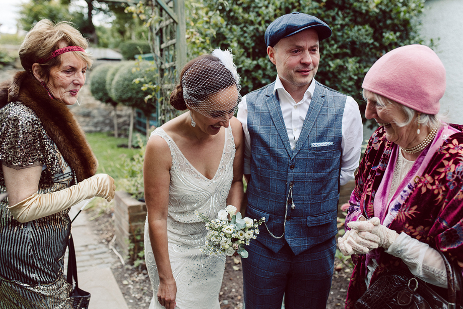 Bride, groom and guests during the ceremony