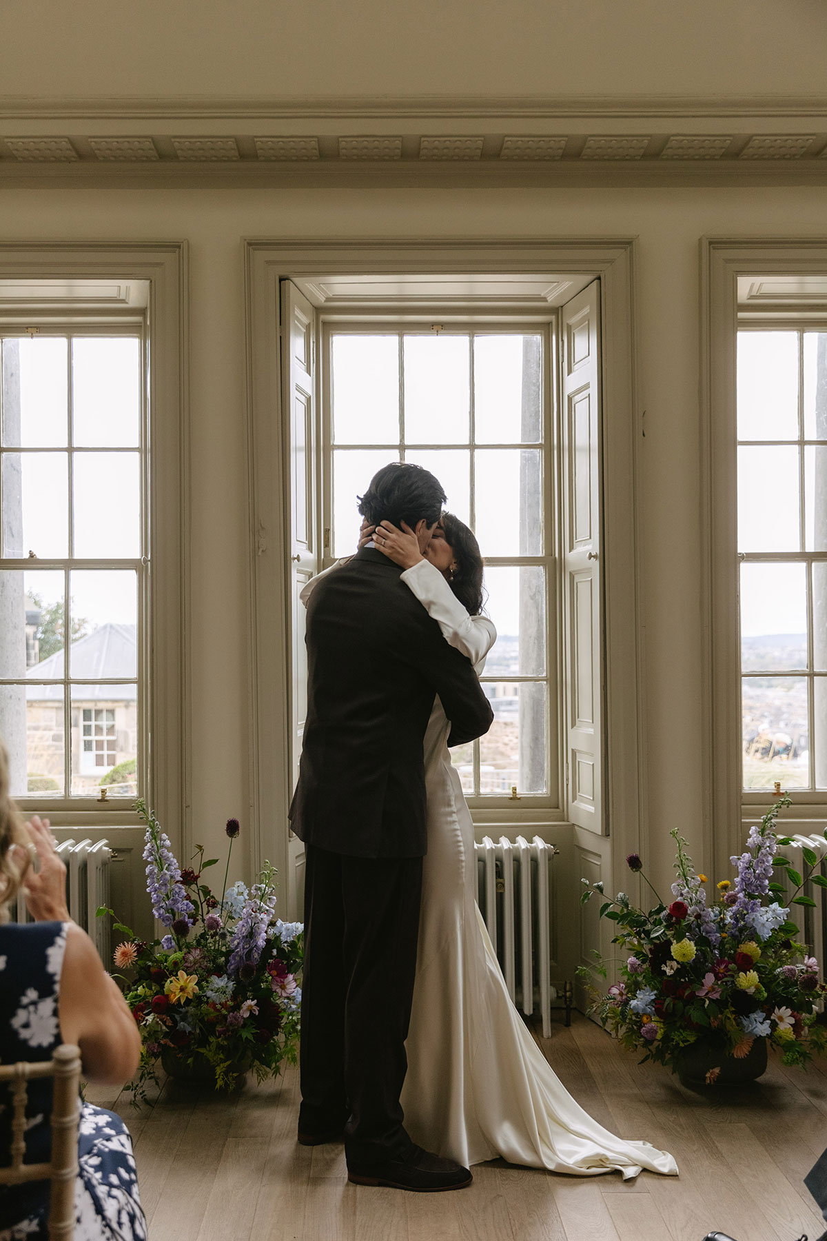 Intimate wedding ceremony inside the City Observatory on Calton Hill, Edinburgh.