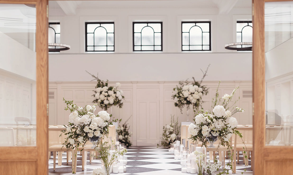 a view through doors to the main hall of the Collector's Hall wedding venue in Glasgow