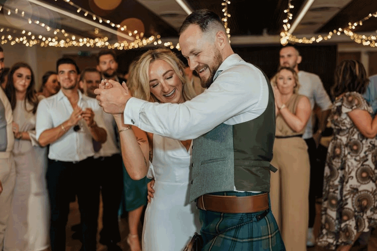 Couple dancing and smiling