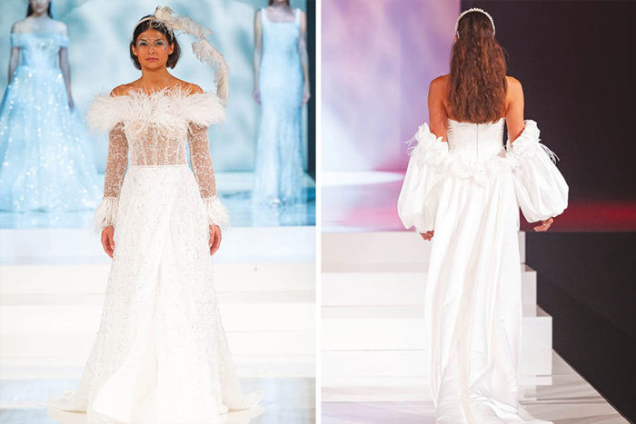 Two models on the runway wearing long wedding dresses