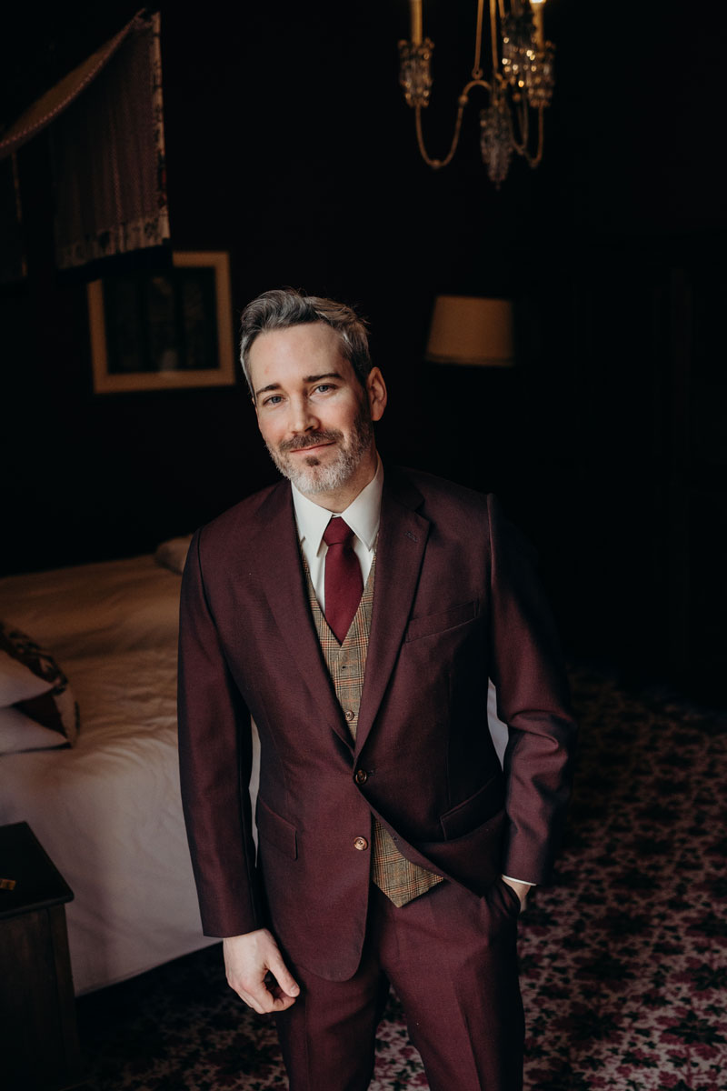 Groom In Burgundy Wedding Suit at Mar Lodge Estate wedding