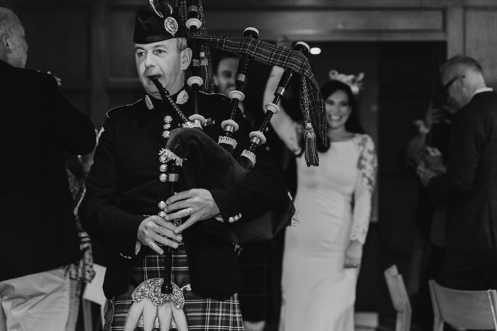 Piper plays in front of bride