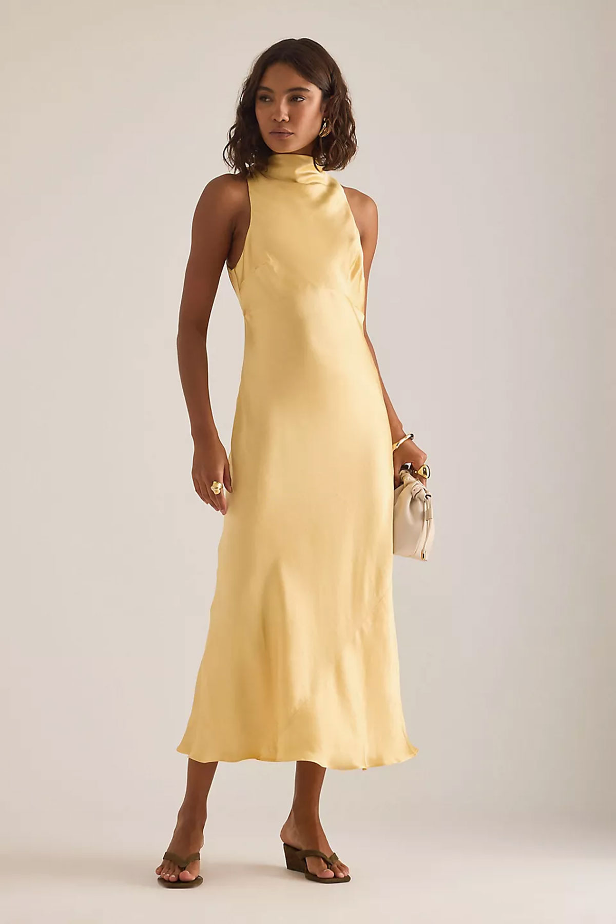 Yellow satin high-neck midi dress with sleeveless cut and minimalist silhouette