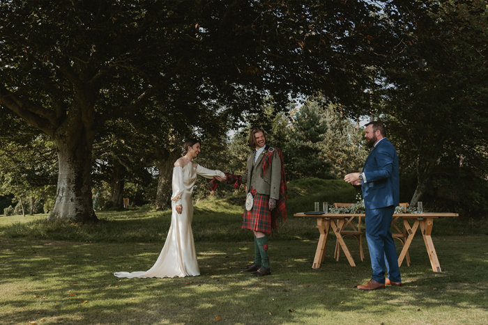 An Outfoor Wedding Ceremony Of A Bride And Groom At Hartree Estates