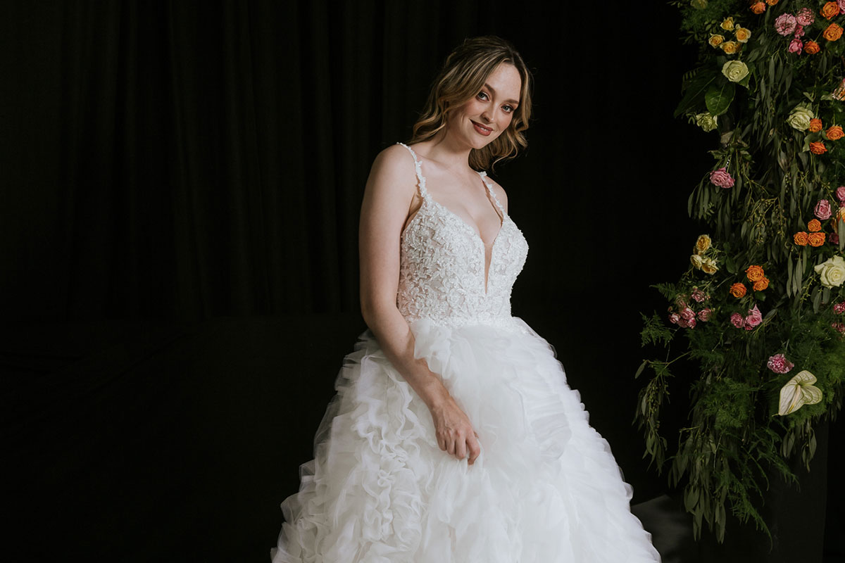 Bride wearing a tulle wedding dress with embellished top at the Scottish Wedding Show 2025