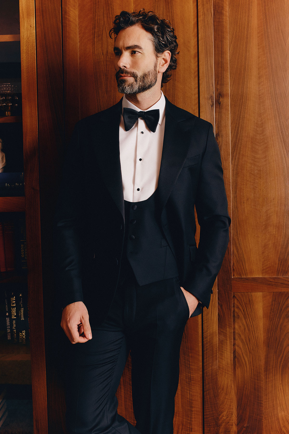 Groom in a black tie tuxedo with bow tie, a classic luxury wedding suit style for a modern Scottish wedding