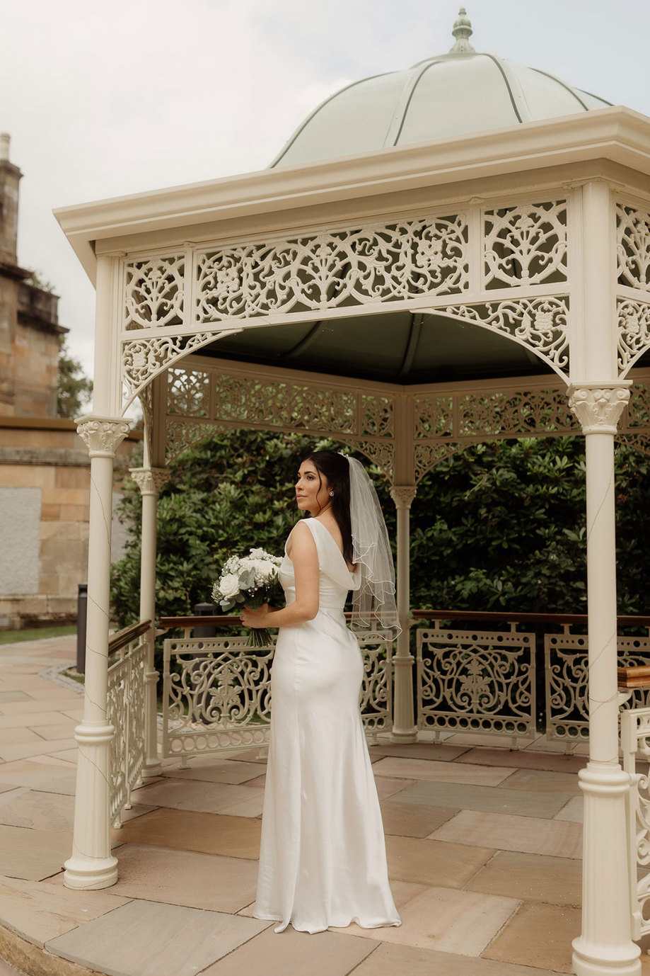 full length photograph of bride in the pavillion at kilmardinny house in bearsden