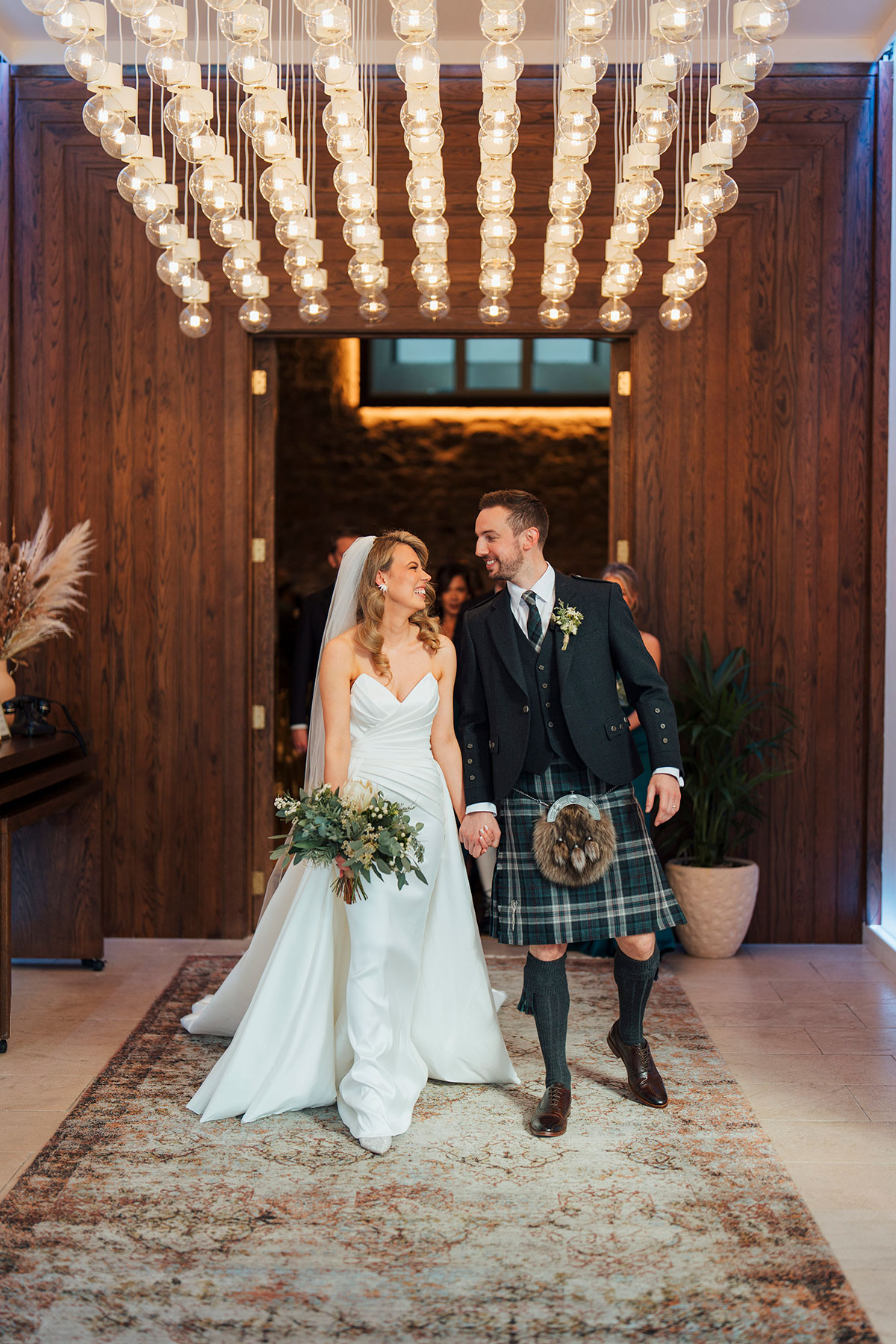 after ceremony picture of bride and groom during wedding at Virgin Hotels Edinburgh