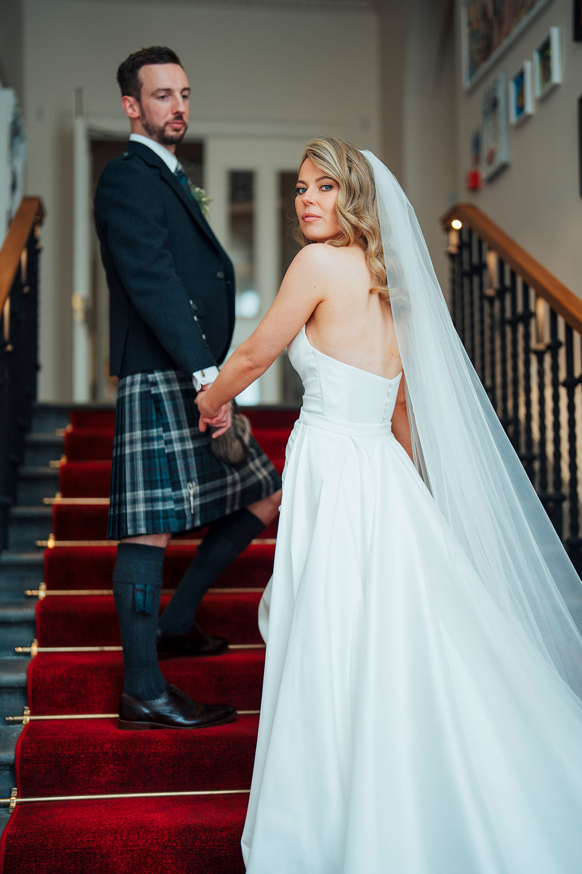bride looks towards camera during wedding at Virgin Hotels Edinburgh