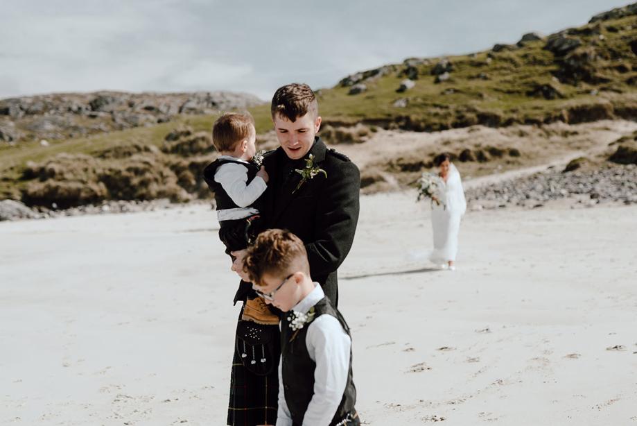 First look with bridal party on Lewis beach