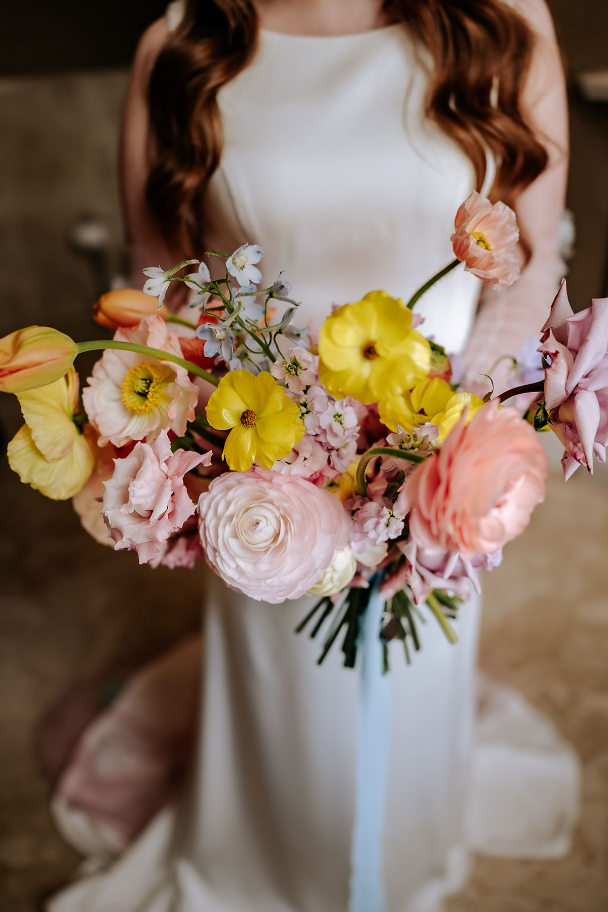 a colourful pastel wedding bouquet by Fruit Salad Flowers