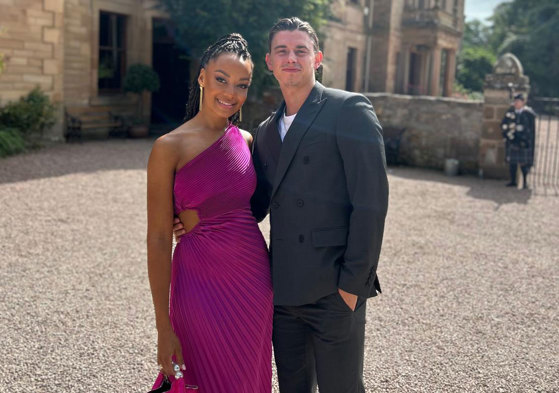 model and influencer maggie liz smith smiles for a photograph with fiance jordan lowdon
