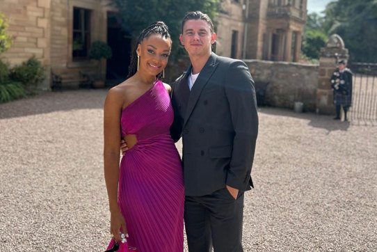 model and influencer maggie liz smith smiles for a photograph with fiance jordan lowdon