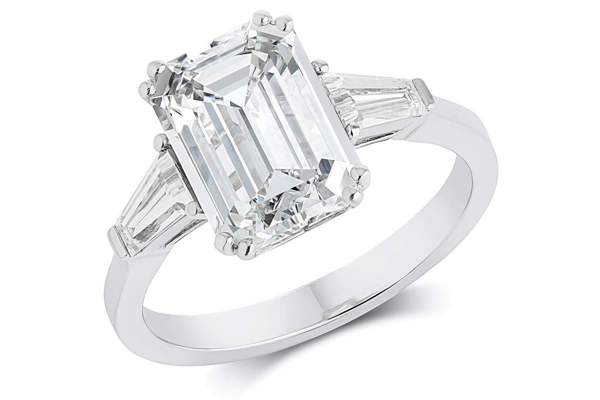 Emerald-cut lab-grown diamond engagement ring with tapered baguette side stones in platinum by Ian Mundie & Son jewellers