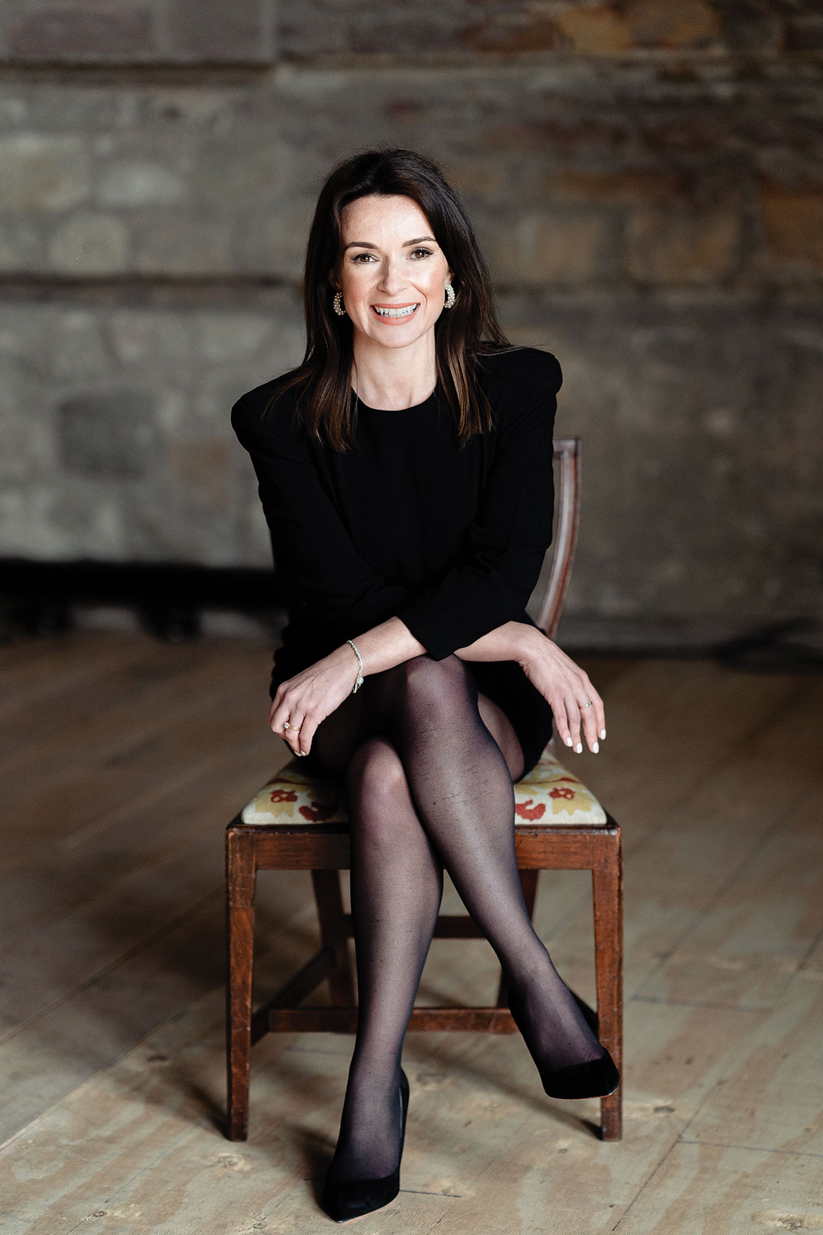 Emma Matthew, founder of Timeless White, female wedding planner in Scotland.