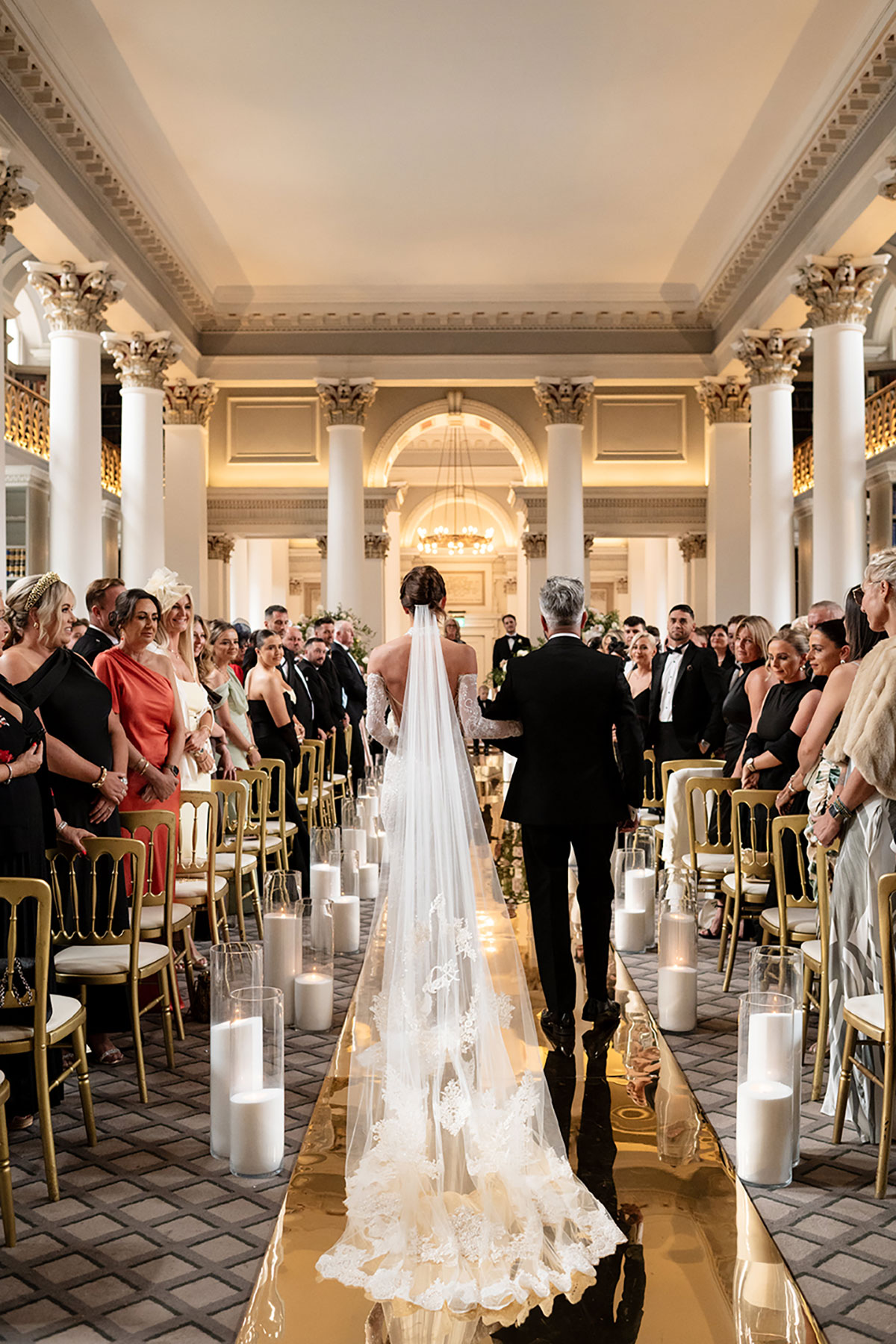 Bride walking down the aisle at The Signet Library wedding ceremony