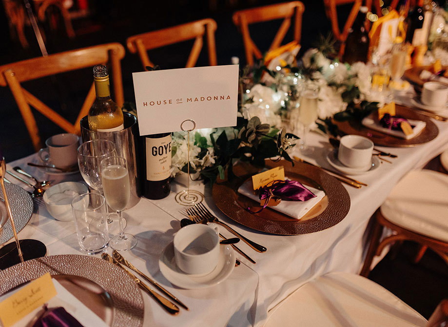 Table Set Up With Table Sign And Dinner Setting 