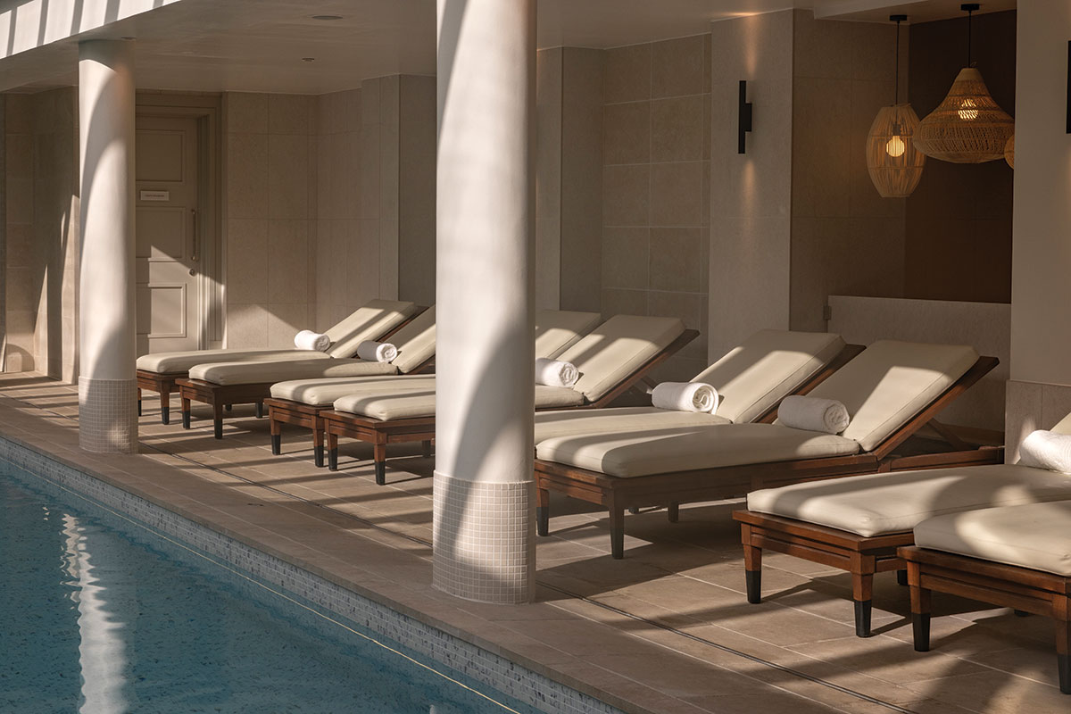 Sun loungers beside the pool at Kohler Waters Spa, Old Course Hotel St Andrews