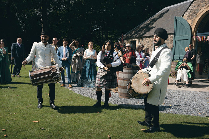 A group of people playing instruments.