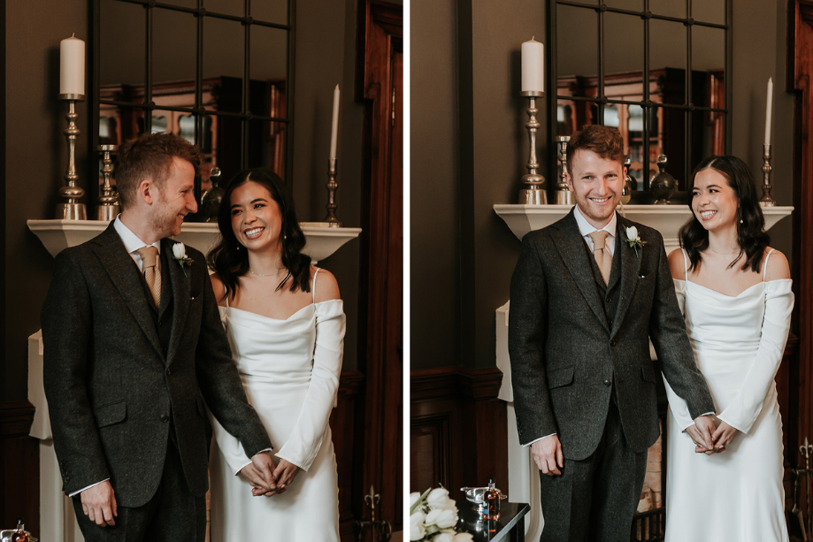 Happy couple hold hands during their wedding ceremony