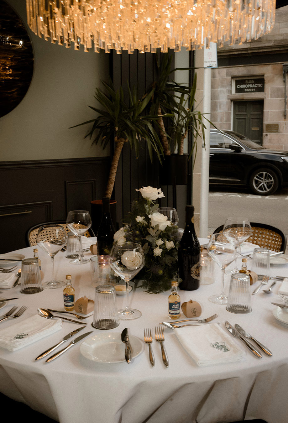 a round table set for dinner at Orrin restaurant in Elgin