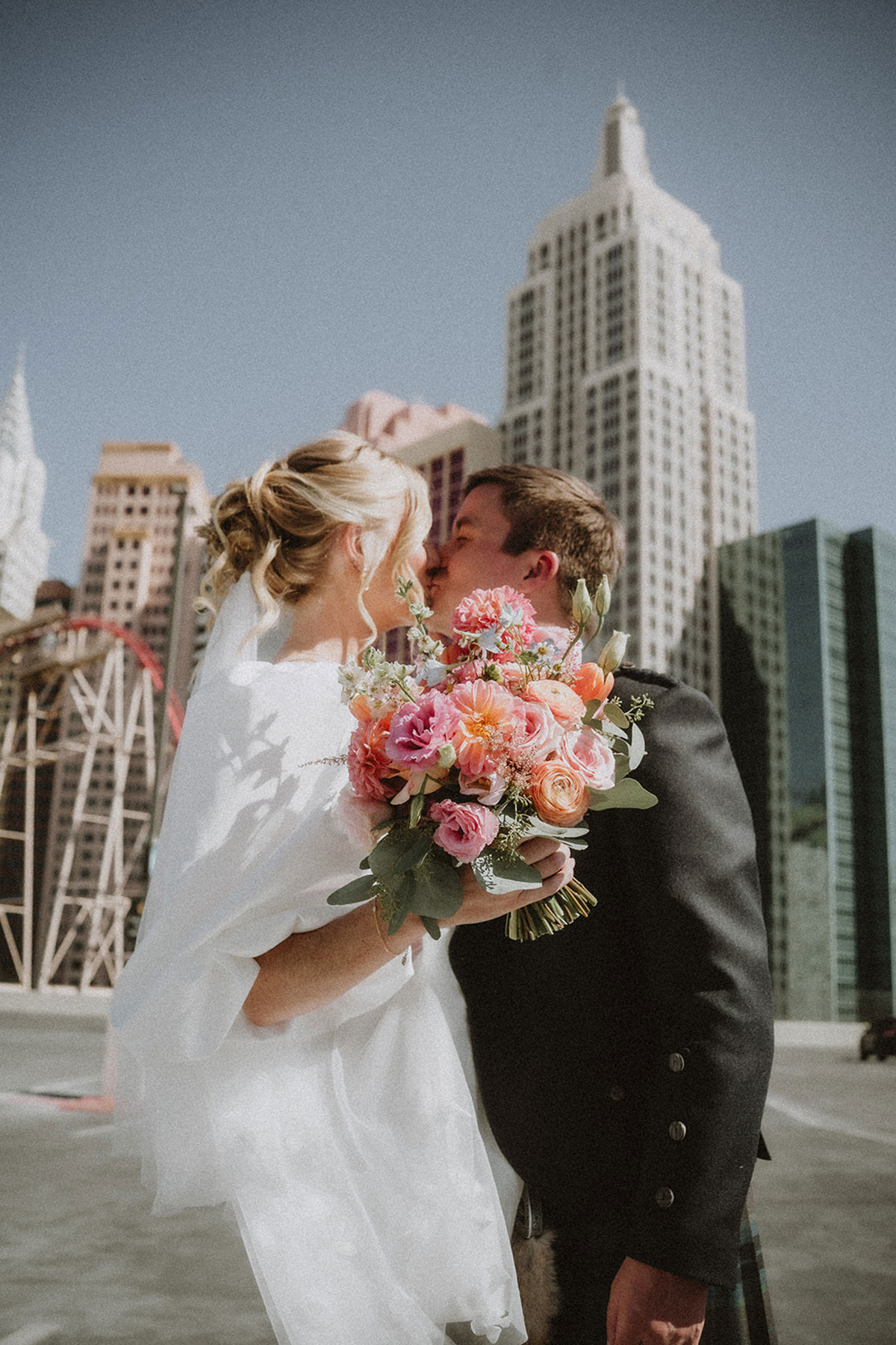 bride and groom kiss after wedding ceremony in las vegas