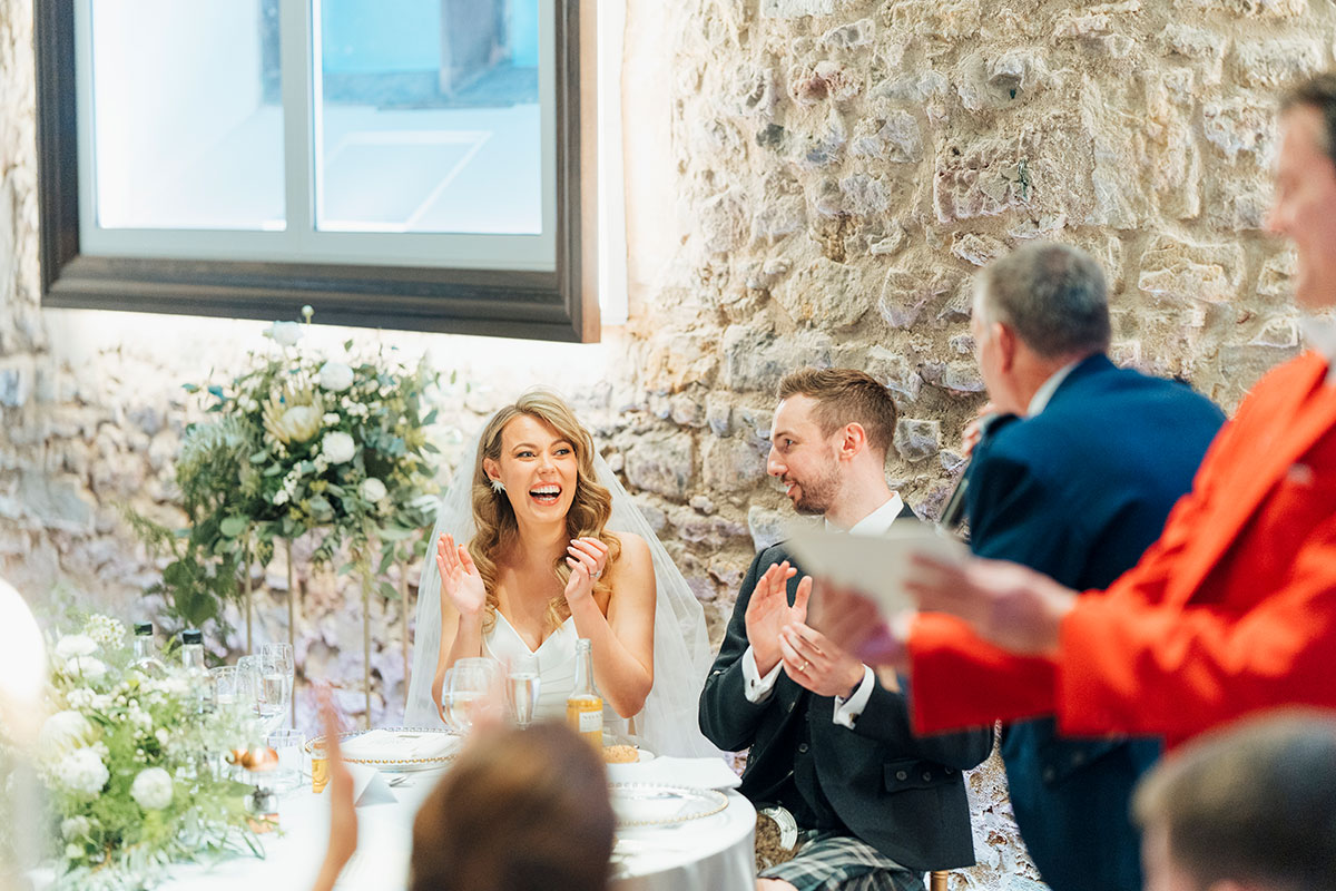 bride and groom during speeches at Virgin Hotels Edinburgh wedding