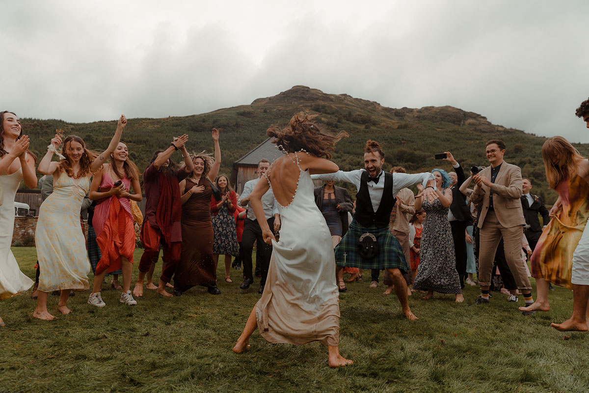 Carrick Castle Estate wedding outdoor ceilidh dancing