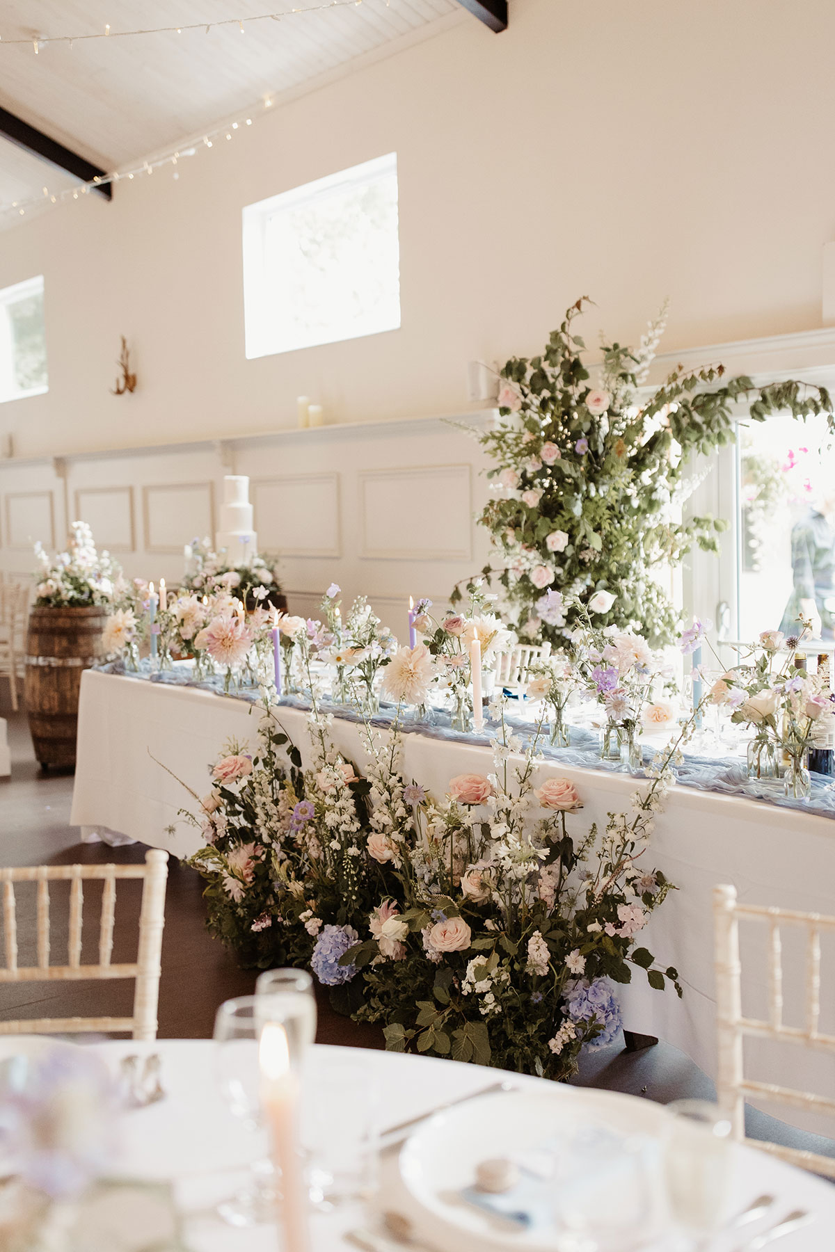 pastel wedding decor in dining room set for a wedding at Netherdale House