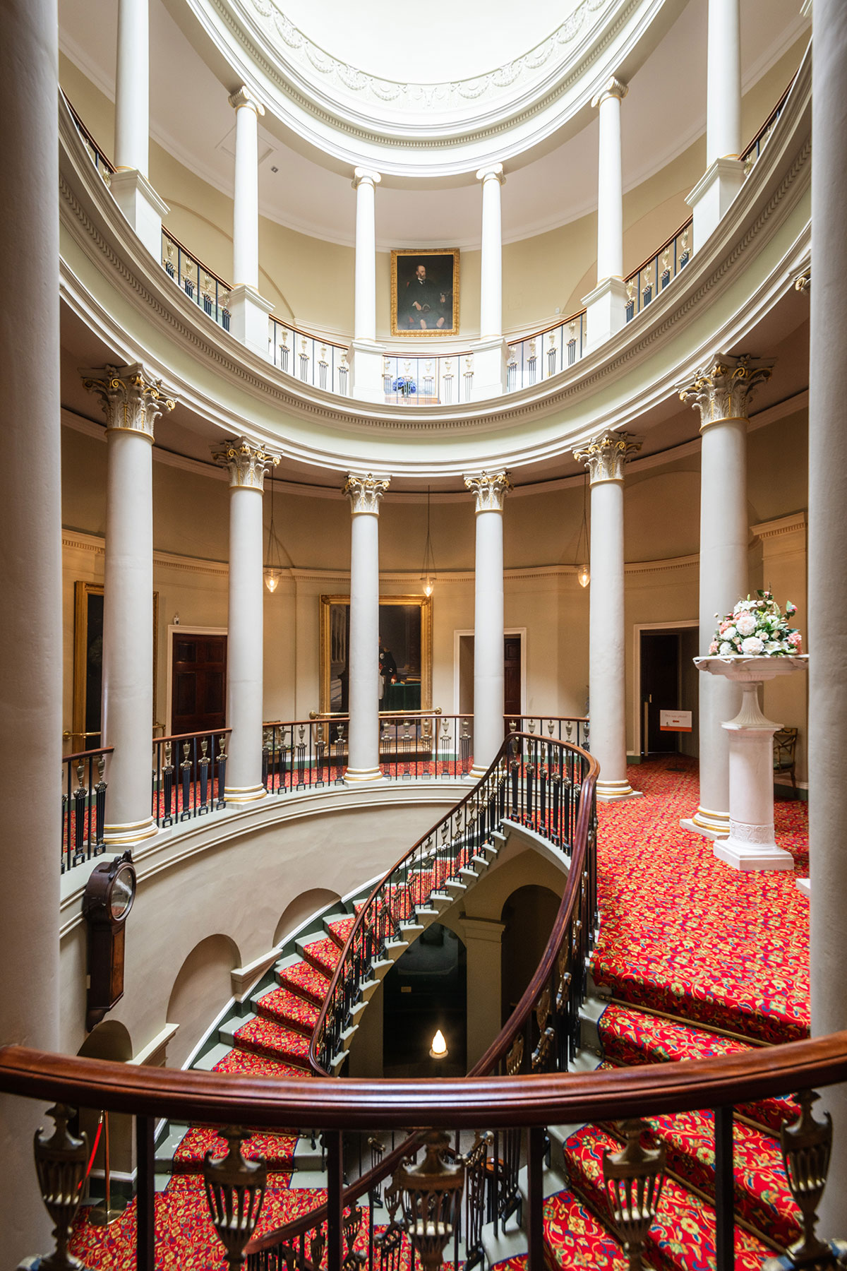 Grand circular staircase and domed rotunda inside Culzean Castle showcasing neoclassical architecture and sweeping wedding photo opportunities