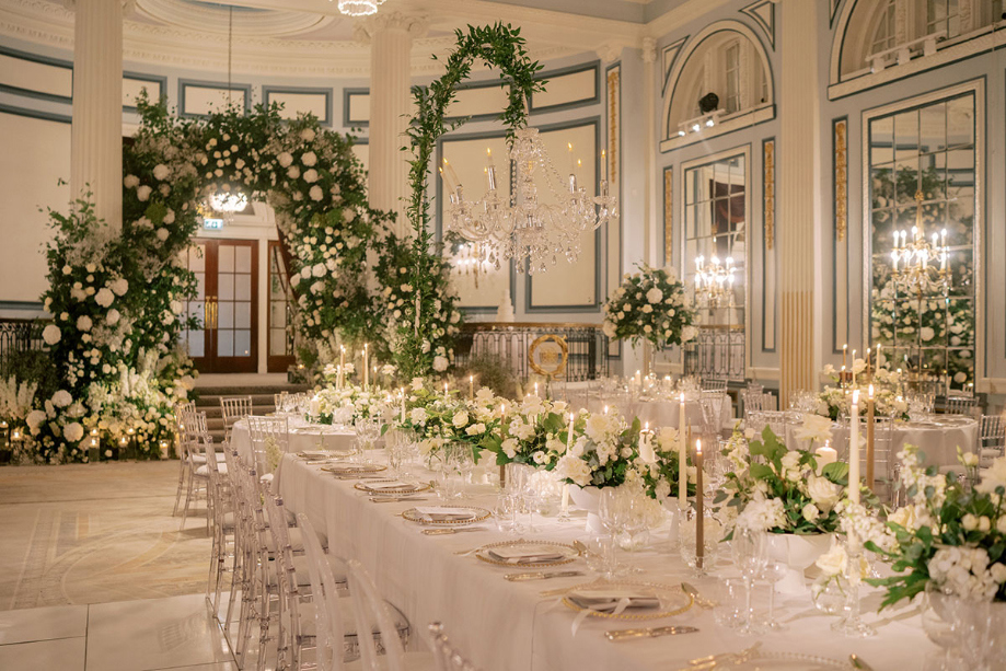 Interiors at Gleneagles featuring white floral table scapes and arch