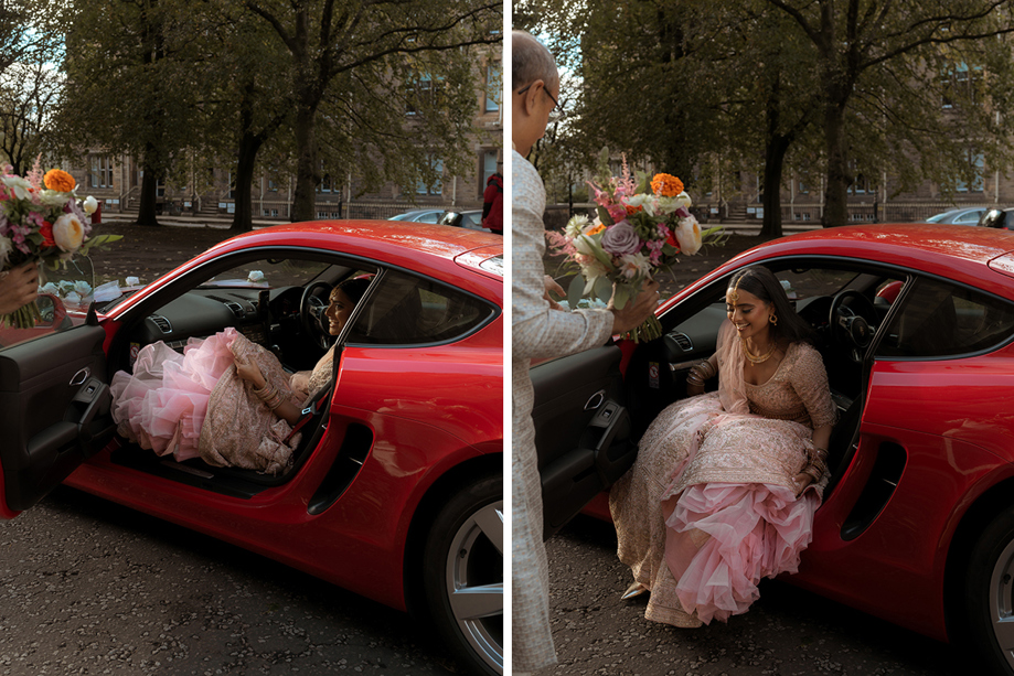 A Bride Wearing A Pink Lehenga Stepping Out Of A Red Car