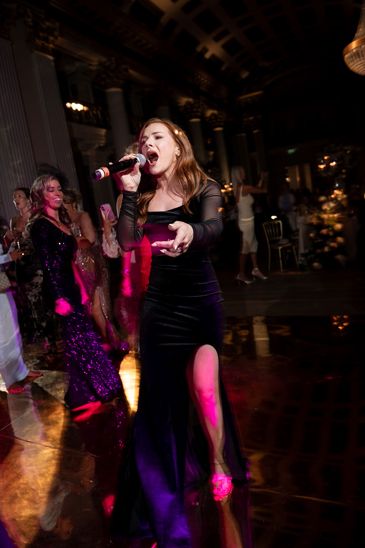 Wedding singer performing live on the dancefloor at The Signet Library wedding reception Edinburgh