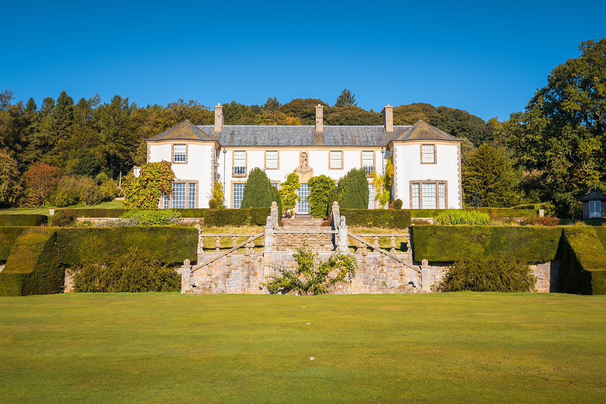 Exterior of Hill of Tarvit mansion with formal gardens and stone staircase, National Trust for Scotland wedding venue in Fife