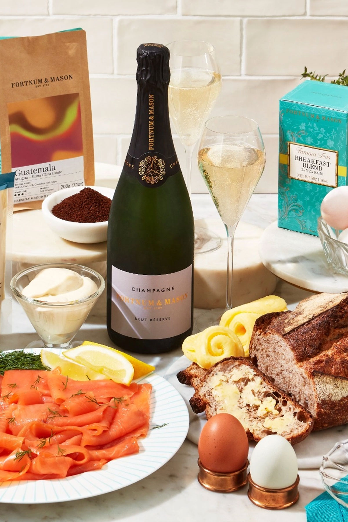 Fortnum & Mason champagne breakfast box with smoked salmon, tea, coffee and champagne, a luxury wedding gift hamper idea