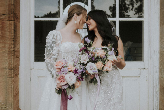 brides looking at one another at Chatelherault shoot