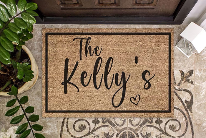 doormat with 'The Kelly's' text 