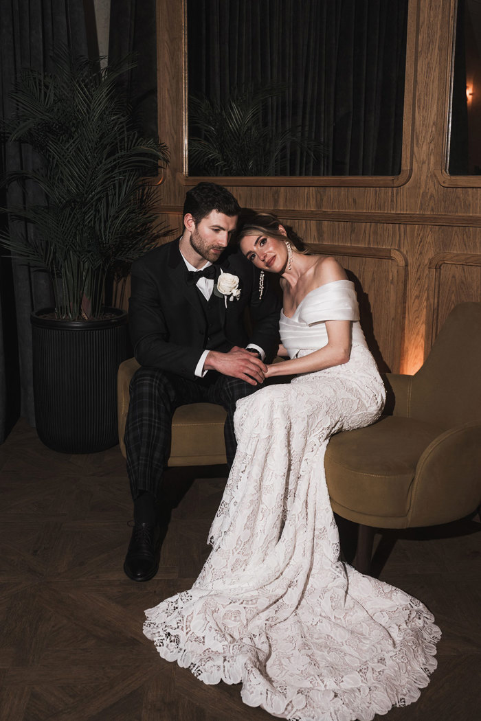a bride and groom seated in the bar at the Exchange wedding venue in Glasgow