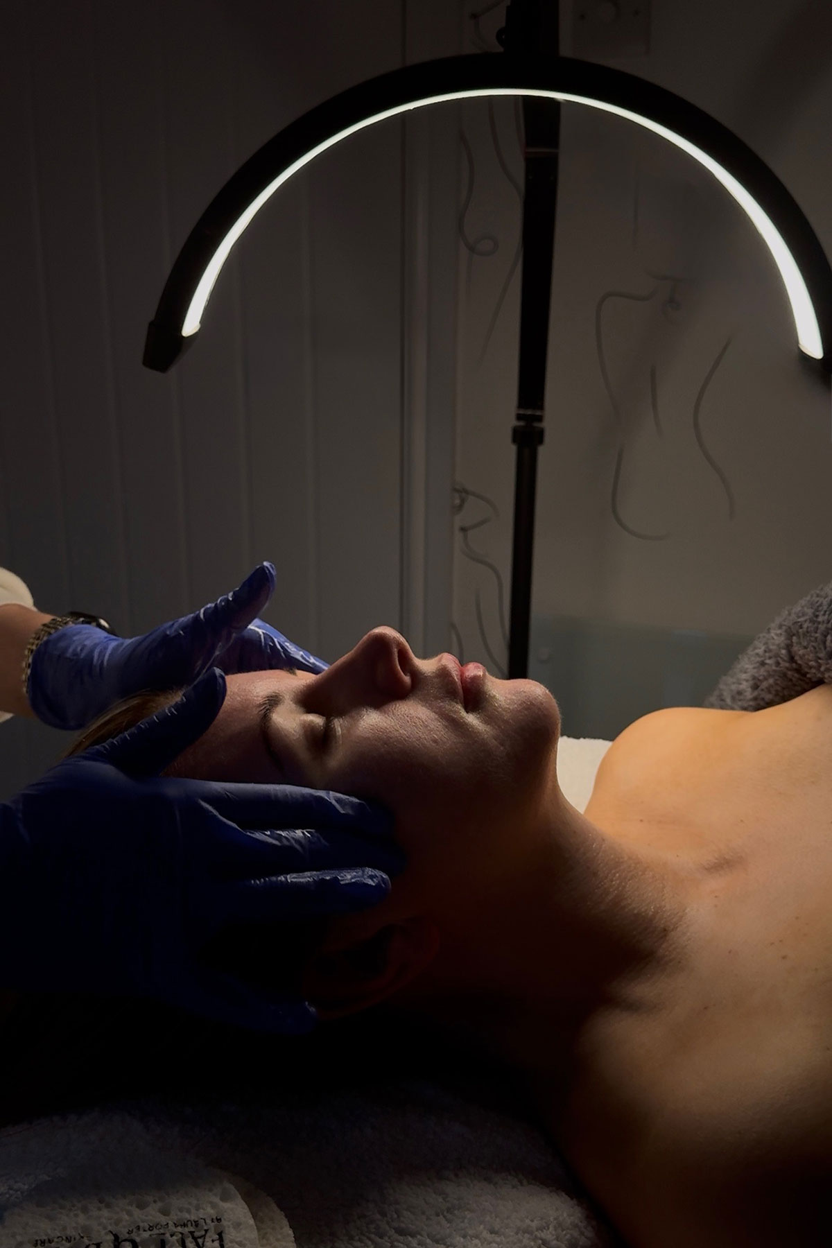 LED light therapy being applied during a clinical facial treatment at FAB Salons Glasgow.