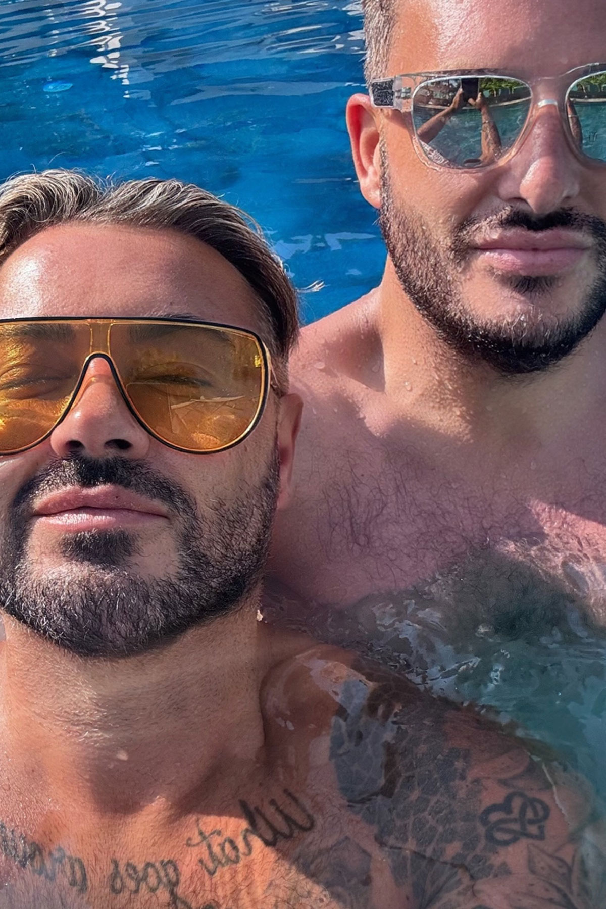 dean rowland takes a selfie in the pool with fiance steven