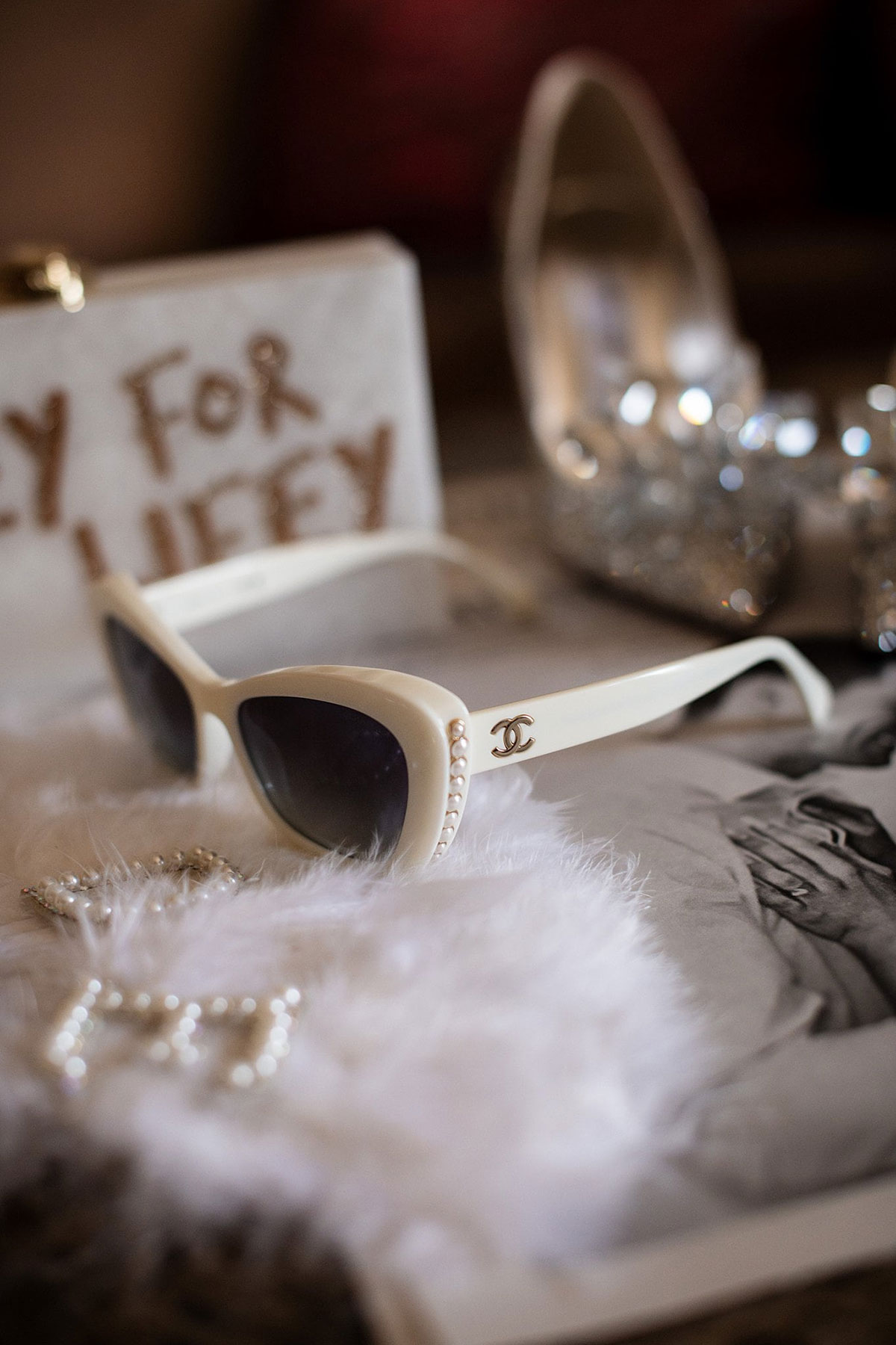 Bridal accessories including Chanel sunglasses, pearls and crystal heels styled on wedding morning at Old Course Hotel St Andrews.
