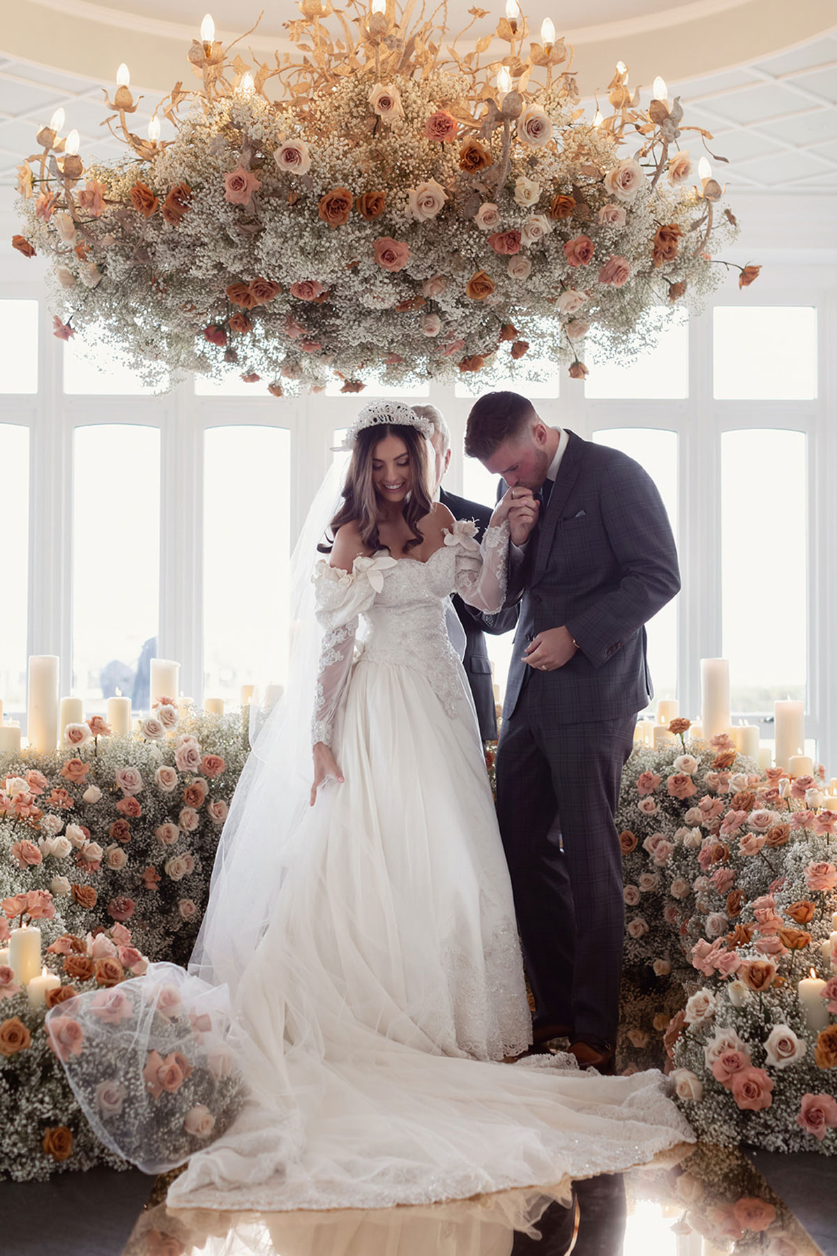 Bride and groom portrait at Old Course Hotel wedding in St Andrews with autumn bouquet and classic wedding styling