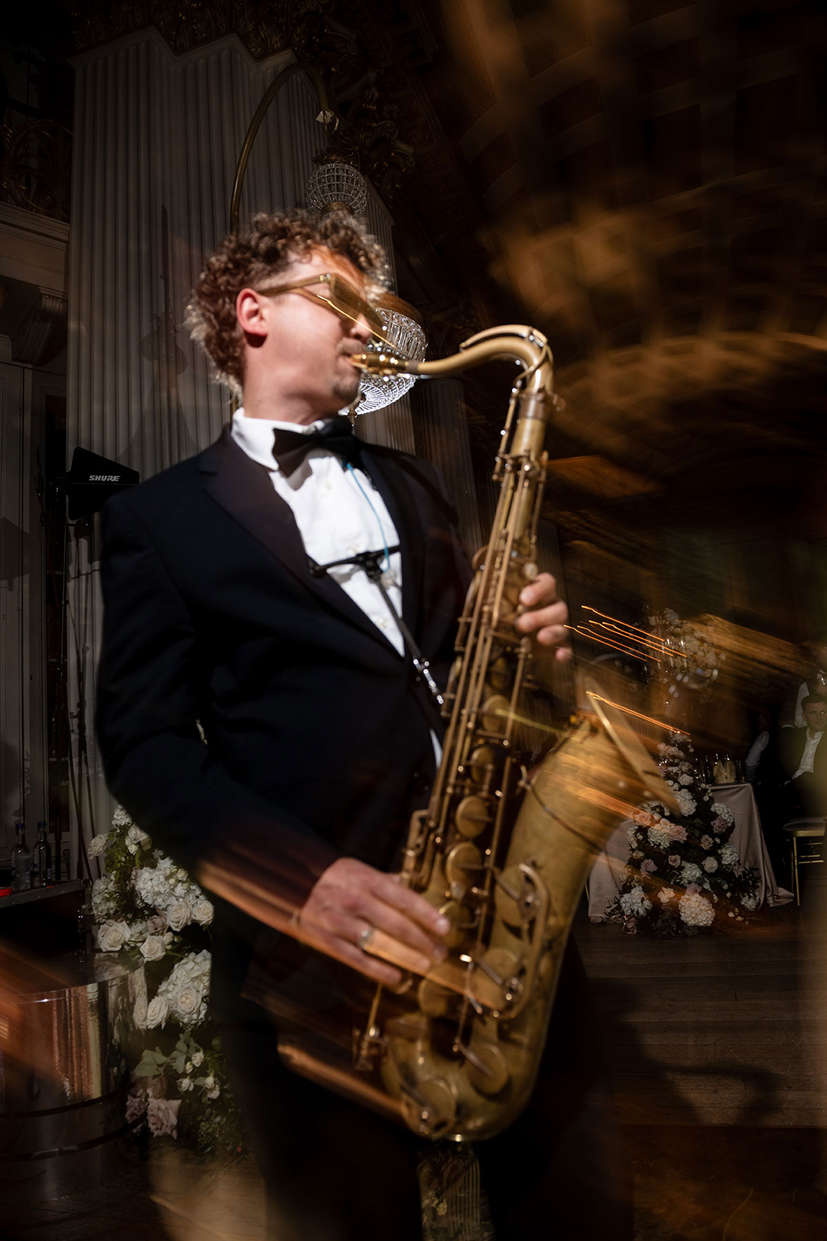 Saxophonist performing during evening reception at The Signet Library wedding in Edinburgh