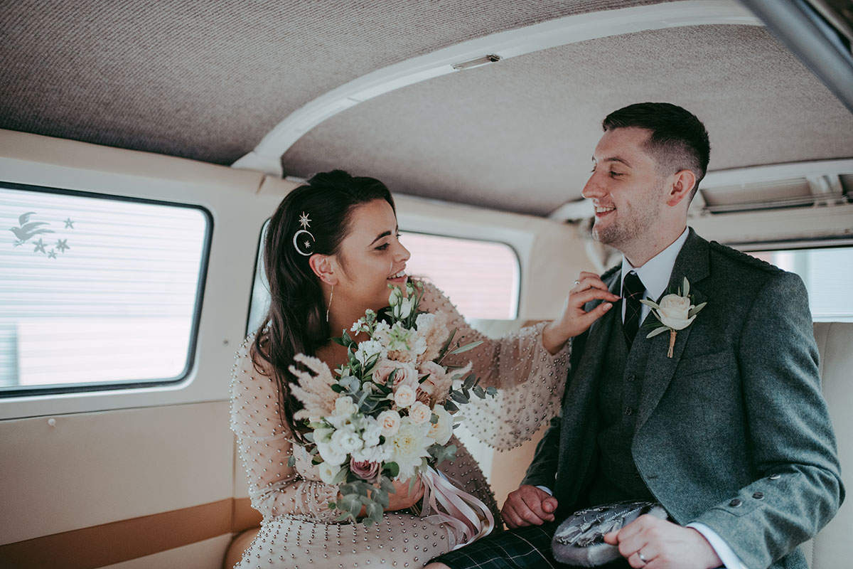Bride and Groom in wedding car